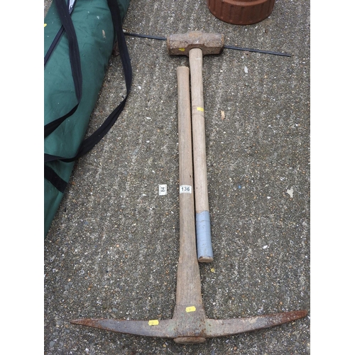 136 - Pick axe and a sledge hammer