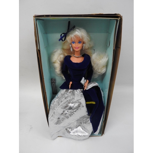 610 - Avon Barbie doll in box