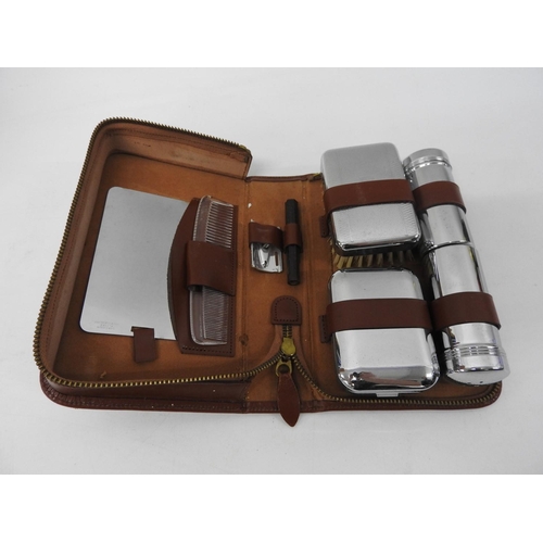 622 - Cased travelling vanity set