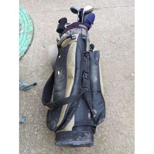 63 - Golf bag and clubs
