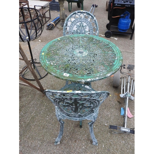 65 - Metal circular garden table and 2x chairs