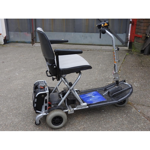 69 - Ultralite mobility scooter with key - seen working, no charger