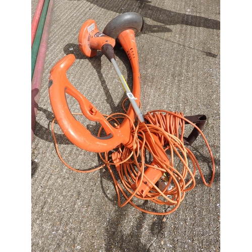 165 - 2x Flymo strimmers seen working