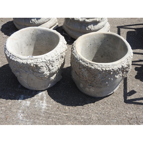 238 - Pair of circular concrete garden planters - floral design