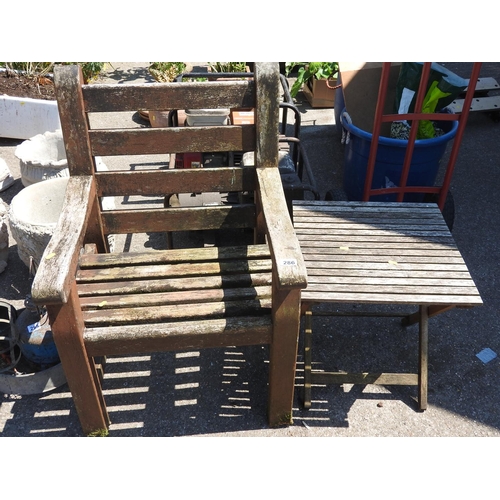 286 - Single wooden garden seat and a folding wooden garden table