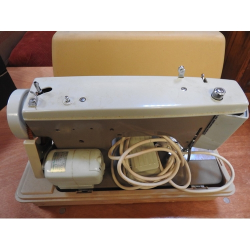 301 - Cased sewing machine