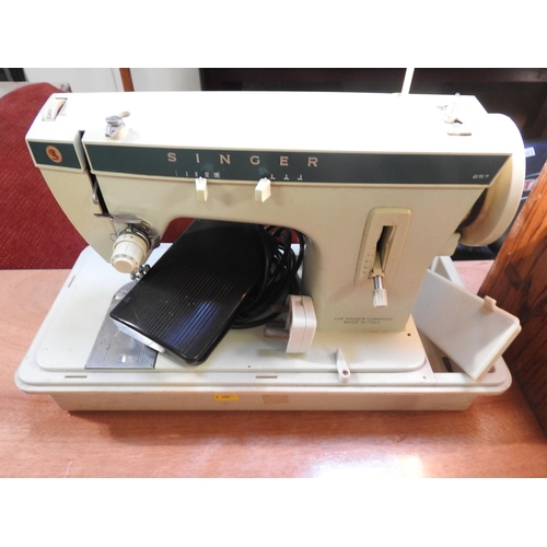 302 - Cased sewing machine