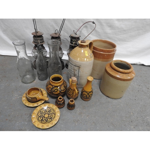 271 - Plastic crate and contents - stoneware flagons, old lamps etc