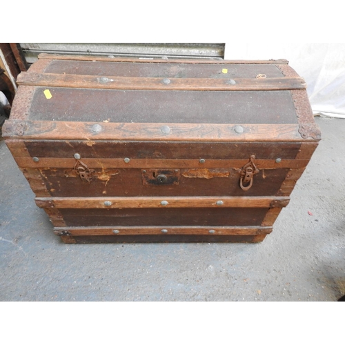 257 - Vintage wood bound dome top trunk