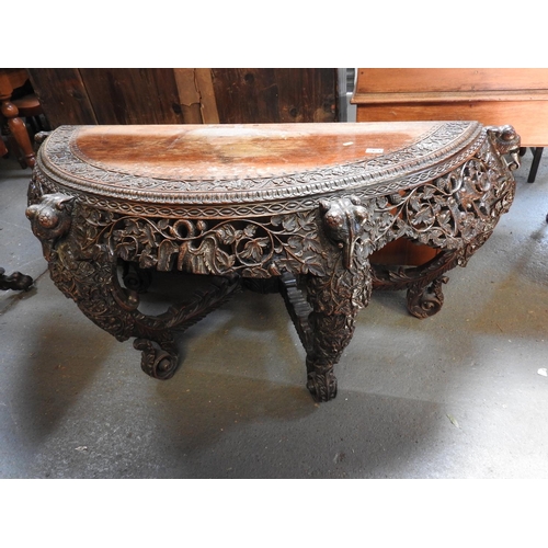 263 - Profusely carved Rosewood Demi lune table depicting Elephants and foliage - 57x 24x 30