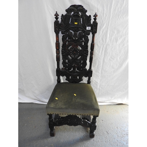 35 - Beautifully carved Oak hall chair with upholstered seat