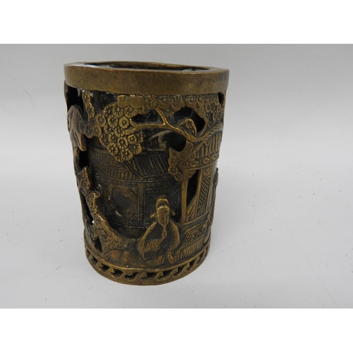 407 - Chinese oval skinned brass pot with pierced decoration and character mark to base