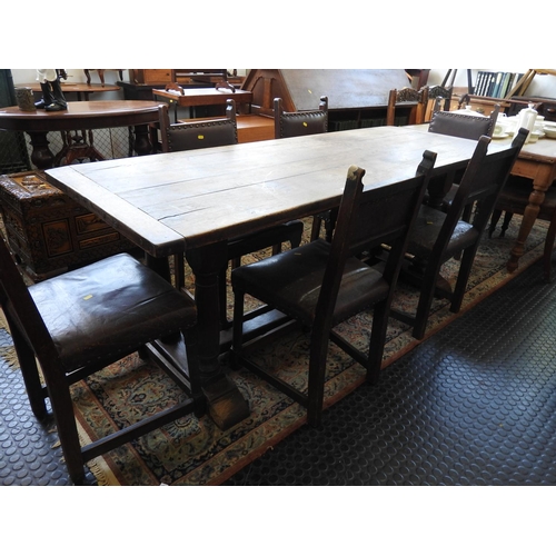 421 - Oak refectory table and 6x Leather seated chairs - 74x 28x 29