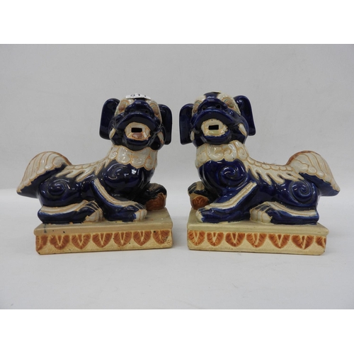 511 - Pair of Chinese style ceramic dogs