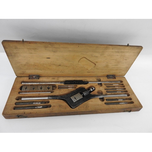 540 - Wood cased tap and die set by W Sarjent