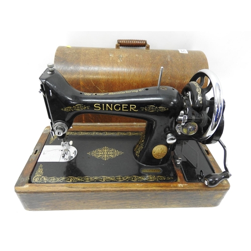 572 - Old wood case sewing machine