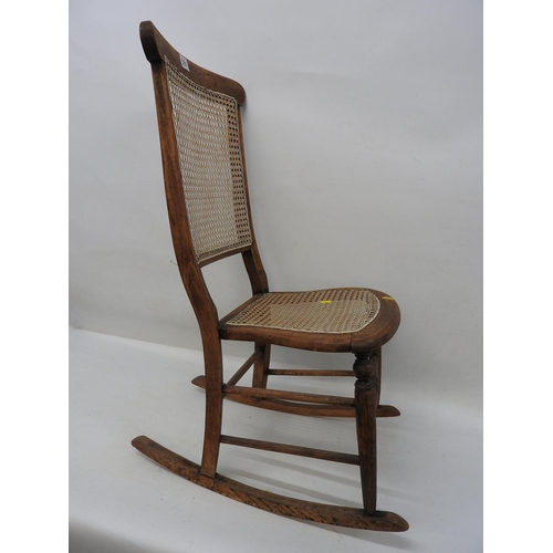 591 - Beech cane seated rocking chair