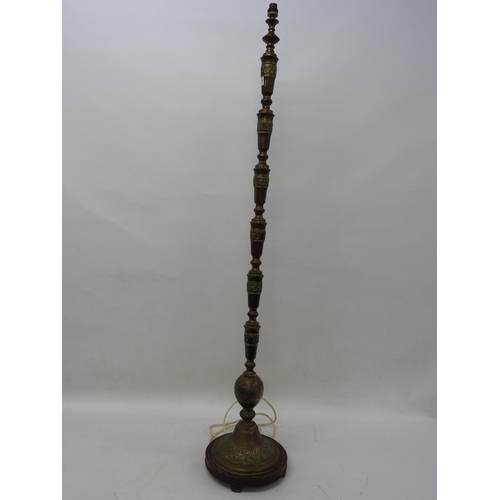 611 - Brass oriental type standard lamp