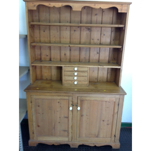 588 - Stripped Pine dresser with open shelves, four small drawers to top and cupboard below - 50x 18x 24