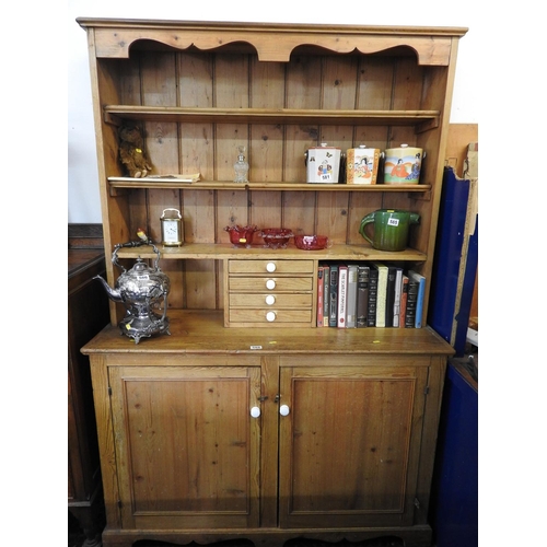 588 - Stripped Pine dresser with open shelves, four small drawers to top and cupboard below - 50x 18x 24