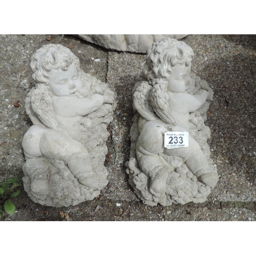 233 - Pair of concrete garden cherubs