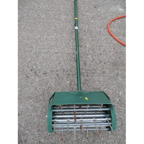 63 - Lawn Aerator