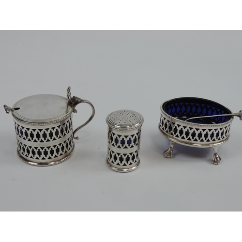 31 - A Three Piece Silver Cruet Set, Mustard Pot, Pepper Pot and Open Salt - Pierced Sides, Claw & Ball F... 