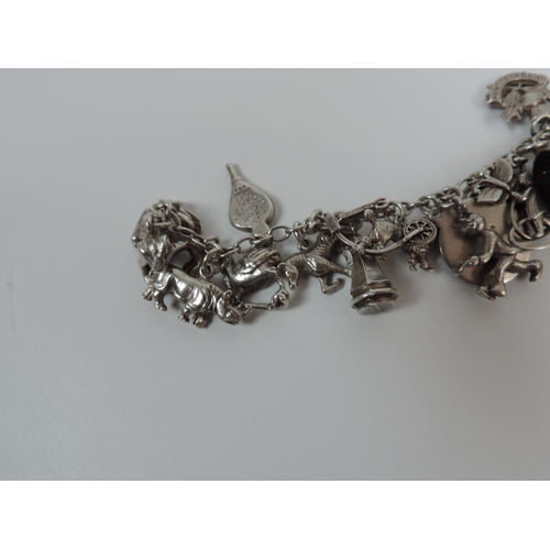 65 - Hallmarked Silver Charm Bracelet