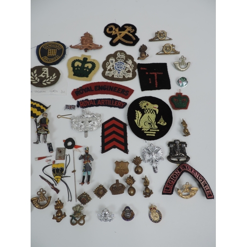 150 - Quantity of Metal and Cloth Military Badges