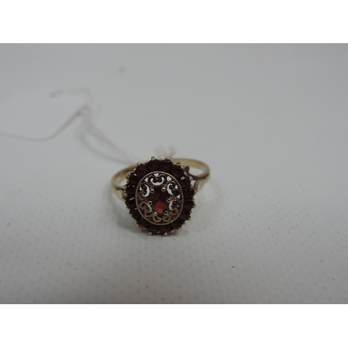 64 - 9ct Yellow Gold Garnet Ring