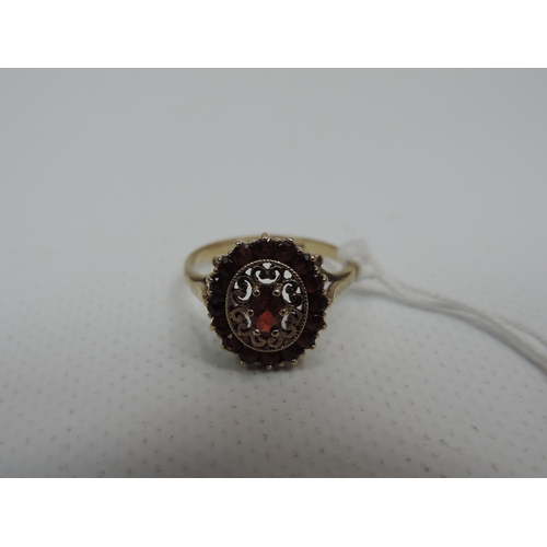 64 - 9ct Yellow Gold Garnet Ring