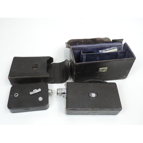 128 - 2x Cine-Kodak Cameras Circa 1930-1940's - One with Film Inside - In Working Order and In Leather Cas... 