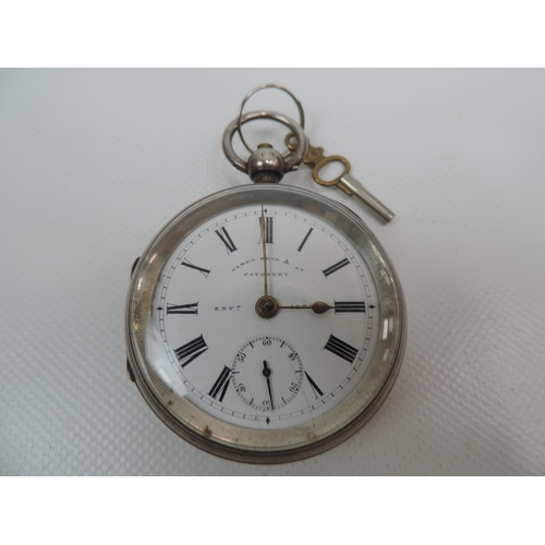 182 - Birmingham Silver James Reid & Co Pocket Watch - with Key