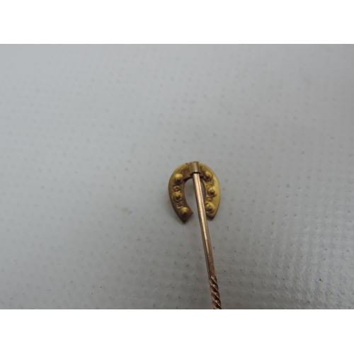 231 - 9ct Gold Seed Pearl Horse Shoe Stick Pin