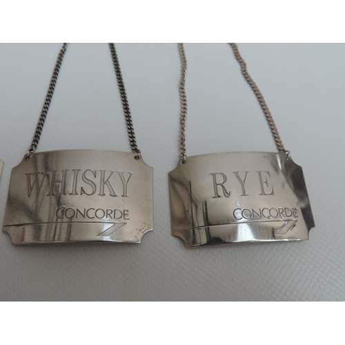 251 - A Set of 8x Concorde Silver Wine Labels, Inscribed 'RYE, VODKA, 'BRANDY', 'SHERRY', 'WHISKEY', 'GIN'... 