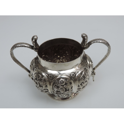 26 - A Three Piece Indian Silver Bachelors Tea Set with Lobed and Profusely Decorated Bodies, Cobra Handl... 