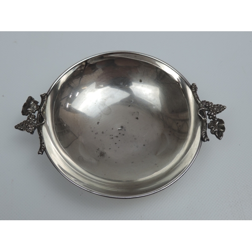 264 - An Early 20th Century Continental 900 Silver Wine Taster, with Grape and Vine Leaf Handles - 4.25