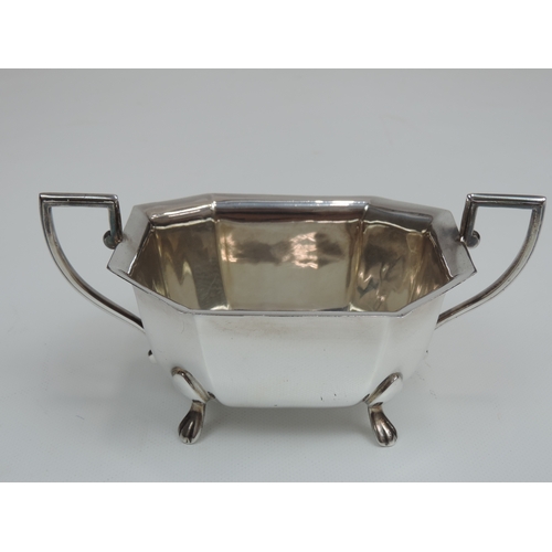 268 - An Art Deco Silver Tea Set - Teapot, Milk & Sugar Canted Rectangular Form Standing on Four Lions Paw... 