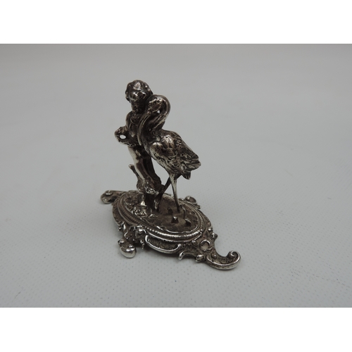 279 - Silver Miniature: An Early 20th Century Continental Cast Silver Miniature of a Putti with a Stork - ... 