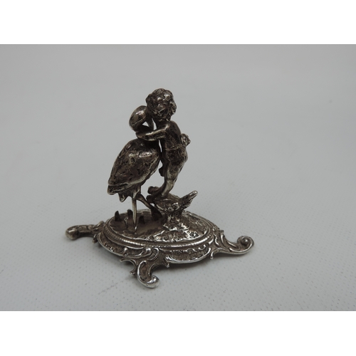 279 - Silver Miniature: An Early 20th Century Continental Cast Silver Miniature of a Putti with a Stork - ... 