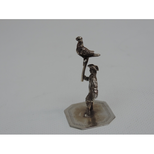 303 - An Early 20th Century Dutch Silver Miniature of a Man Holding a Bird - Hallmarked to the Base - The ... 