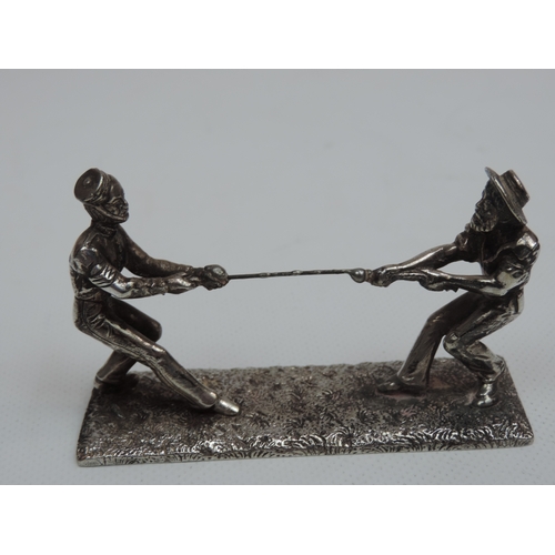 256 - A Victorian Silver Plated Knife Rest Modelled as a Tug of War Between Two Men - It Carries the Desig... 