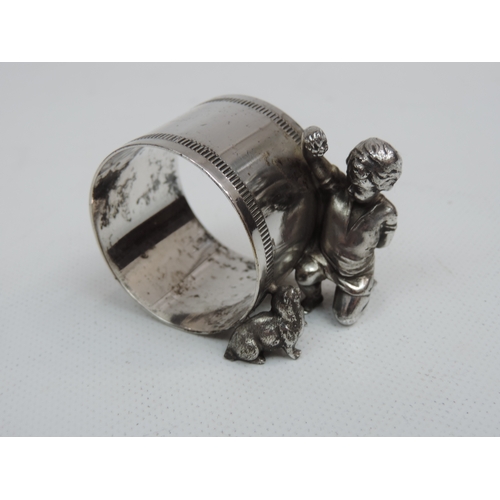 263 - A Pair of Late Victorian Silver Plate Figural Napkin Rings, One with a Young Boy and His Dog, the Ot... 