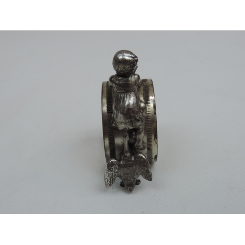 221 - A Late Victorian Large Silver Plate Figural Napkin Ring of a Young Girl being Pecked by a Large Bird... 