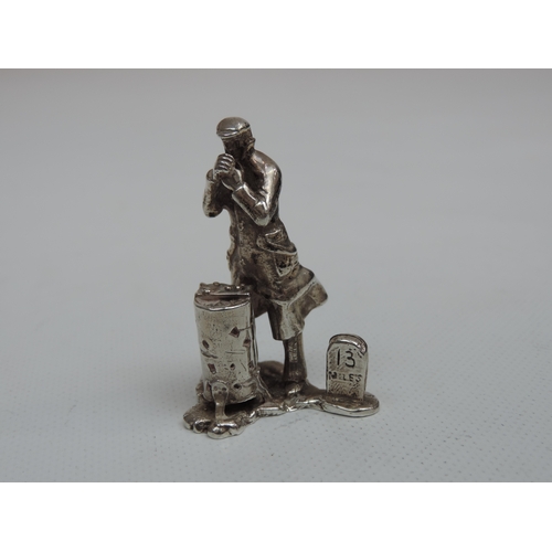 180 - A Menu Holder in the form of a Chestnut Seller, Roasting his Nuts over a Brazier - Hallmarked for Lo... 