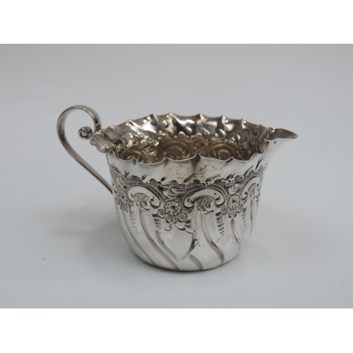 305 - A Late Victorian Silver Cream Jug with Handkerchief Rim, Embossed Foliate Body and Vacant Cartouche ... 