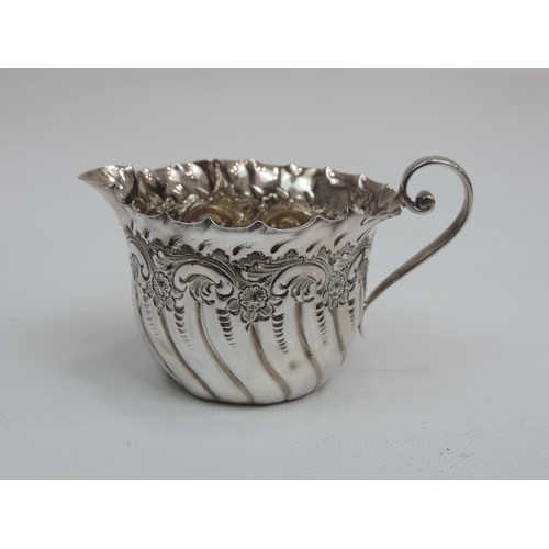 305 - A Late Victorian Silver Cream Jug with Handkerchief Rim, Embossed Foliate Body and Vacant Cartouche ... 