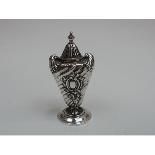 295 - A Victorian Pepper Pot, with a Gadrooned Vase Shaped Body and Shell Shoulders - Hallmarked for Birmi... 