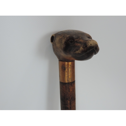 567 - Walking Cane with Carved Otters Head Top