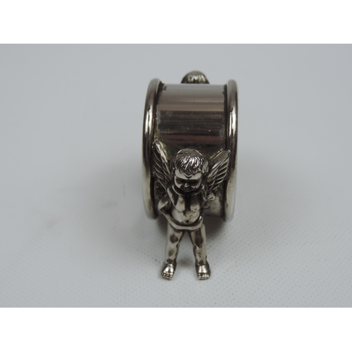 207 - A Late Victorian Silver Plate Figural Napkin Ring of Two Winged Cherubs - Diameter is Approx 1.75